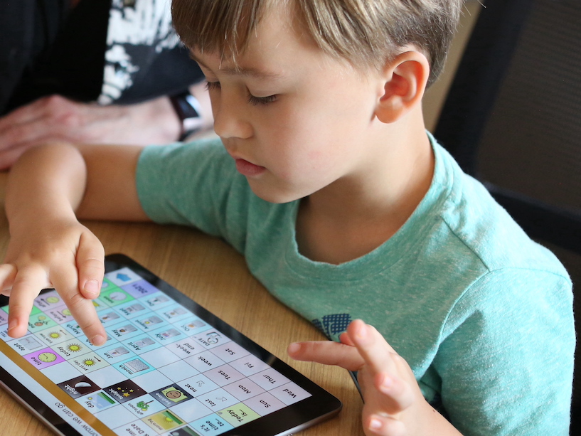 Child Using AAC device